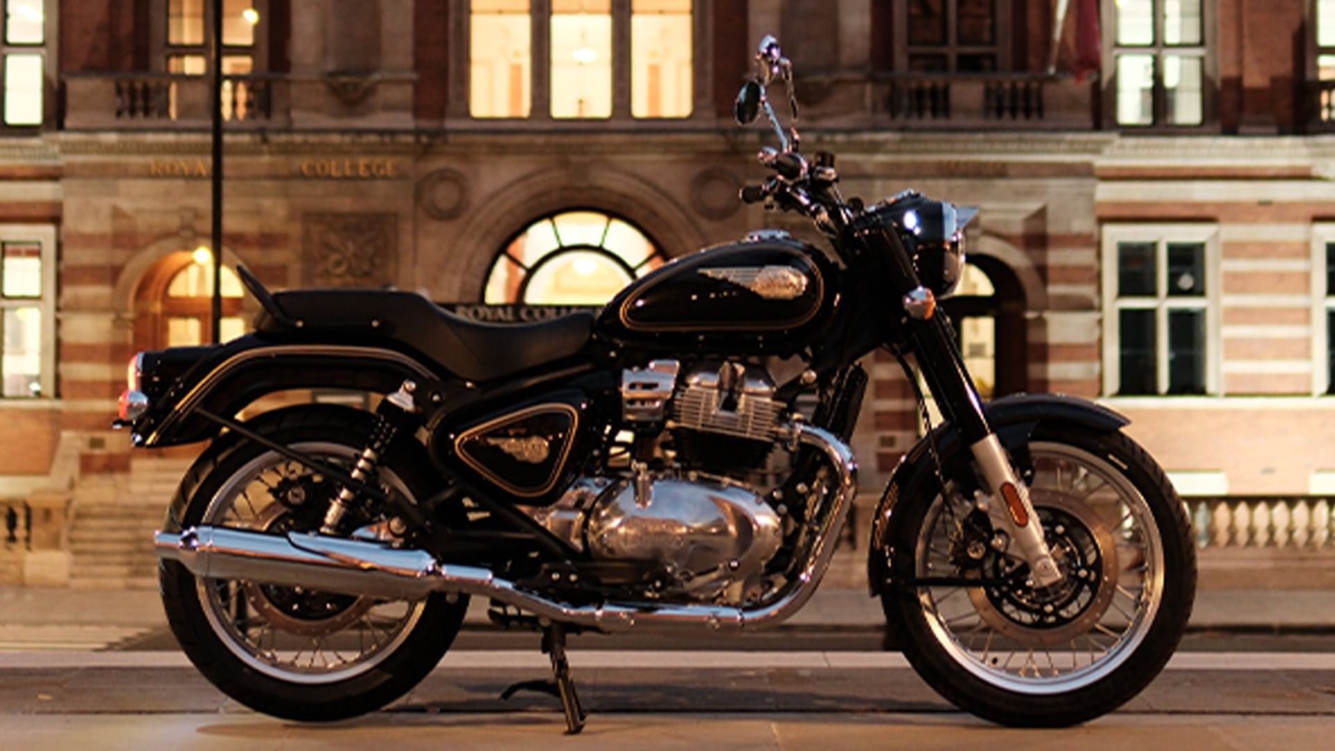 A Bullet 650 parked outside a brick building, photographed by Royal Enfield