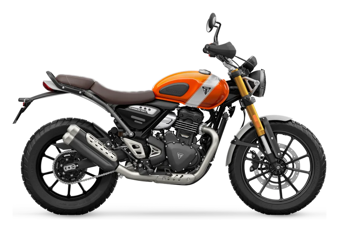 2026 Triumph Scrambler 400 X in Aluminum / Baja Orange, studio image by Triumph